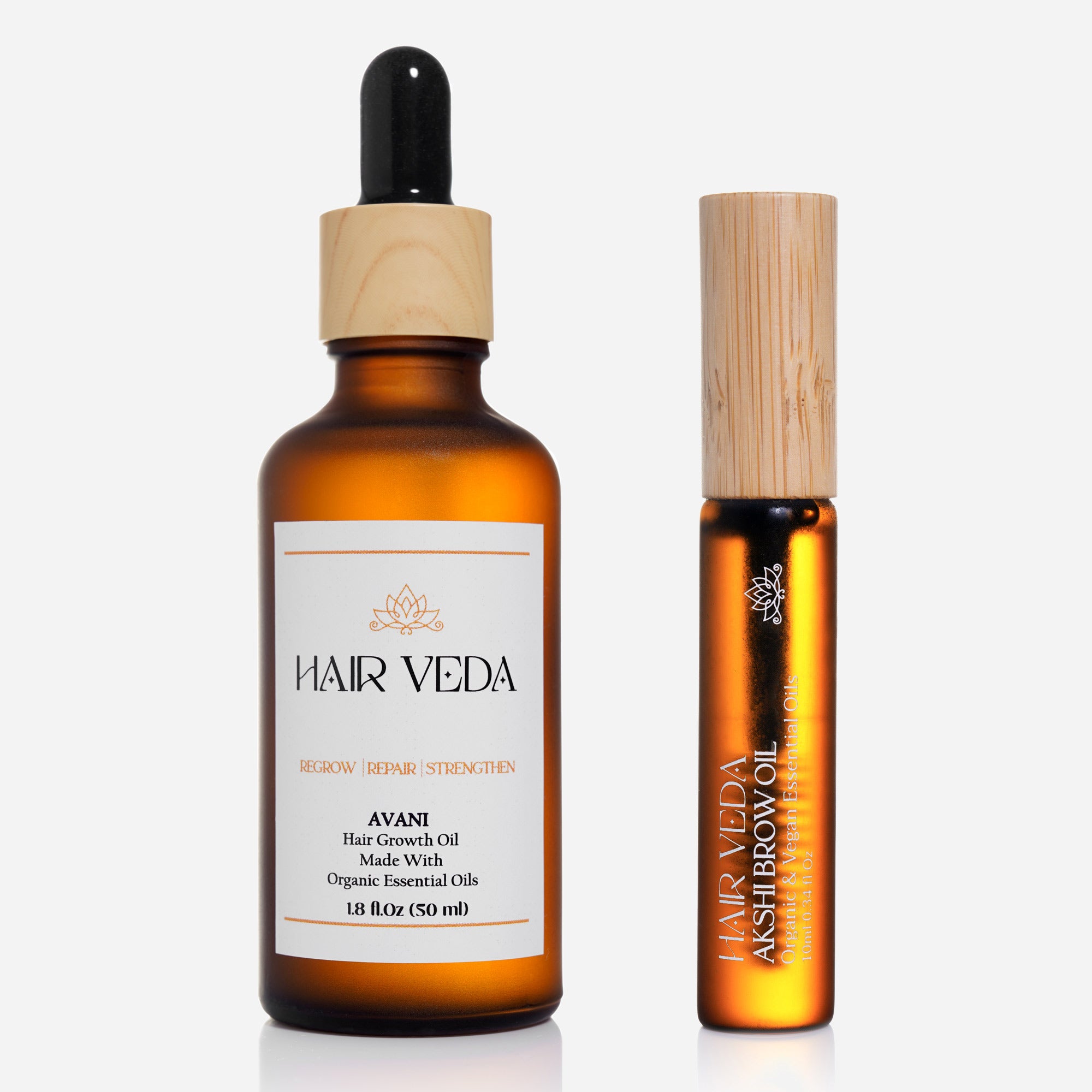 Hairveda hair oil and roller set, featuring nourishing oil for hair and brows in a sleek, modern design.