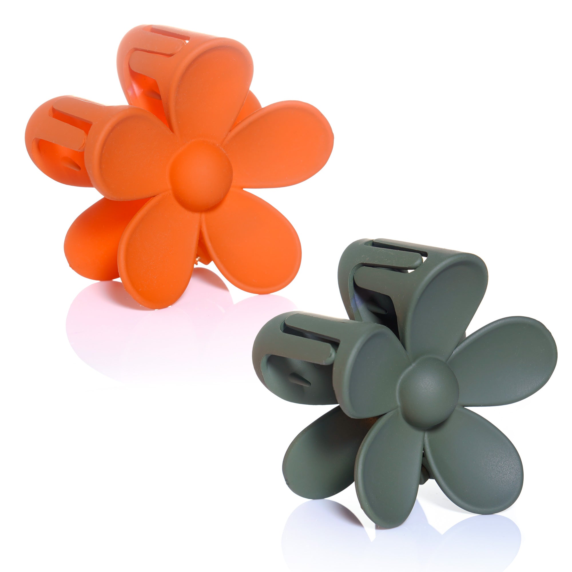 Two plastic flower-shaped hair clips displayed side by side.