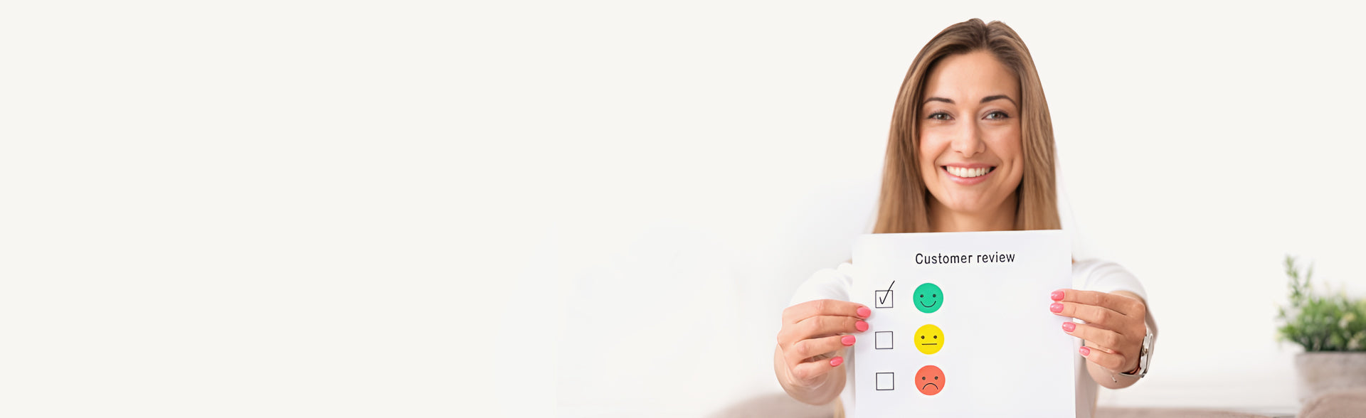 A woman proudly holds a paper with a check mark, symbolizing a positive customer review.